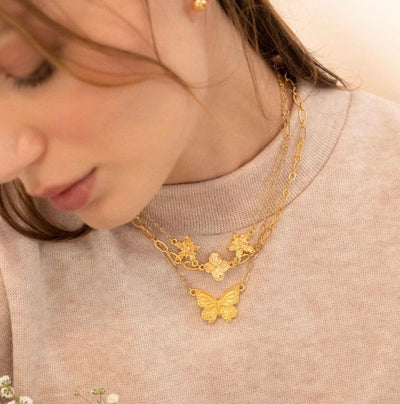 Flores y Mariposa Necklaces