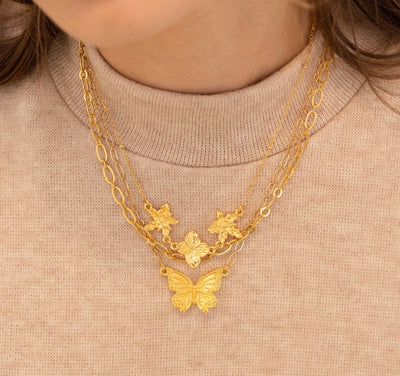 Flores y Mariposa Necklaces